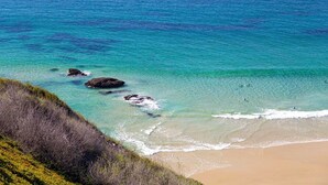 A beach with clear turquoise water, rocky outcrops, and a sandy shore. - Spectacular Oceanfront  - the Best Views in Dana Point !!!!! (Dana Point)
