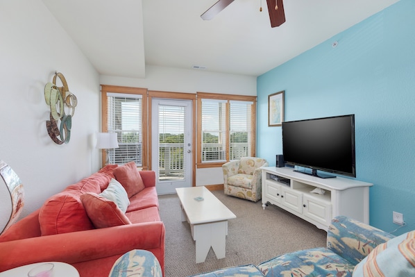 TV, books - C112A - Happy Place, Cozy Soundfront Condos in Nags Head, NC! Pet Friendly! (Nags Head)
