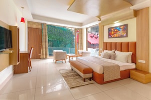 Quarto premium | Cortinas blackout, ferros/tábuas de passar roupa