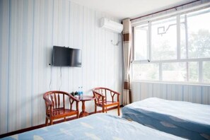 Triple Room | Desk, blackout drapes, free WiFi