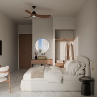 Quarto moderno com cama, espelho redondo, toucador com pia, guarda-roupa e ventoinha no teto.