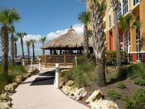 Relax in a serene tropical setting surrounded by palm trees and beautifully landscaped gardens.