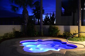 A heated pool, pool umbrellas