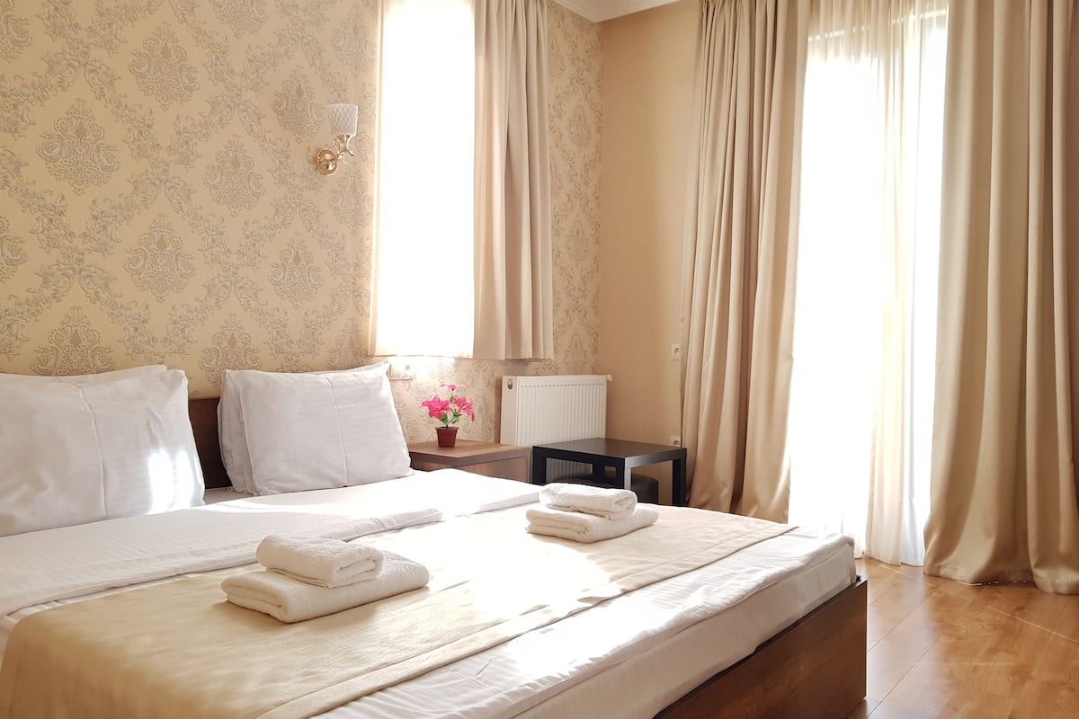 Deluxe Double Room, Balcony | Minibar, blackout curtains, cots/infant beds, rollaway beds