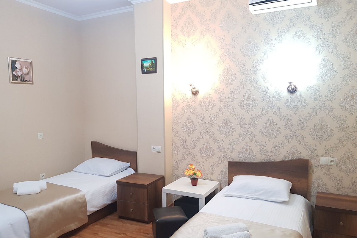 Deluxe Double or Twin Room | Minibar, blackout curtains, cots/infant beds, rollaway beds