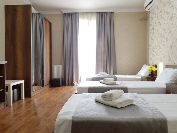 Standard Triple Room, Balcony | Minibar, blackout drapes, cribs/infant beds, rollaway beds - Gold Line Hotel (Tbilisi)