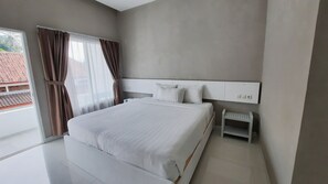 Habitación Deluxe doble | Escritorio, wifi gratis, ropa de cama y accesible en silla de ruedas