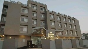 A multi-story hotel named Kukda Resort with a modern design, featuring a prominent entrance and a signboard. - Kukda Resort Chittorgarh (Chittorgarh)