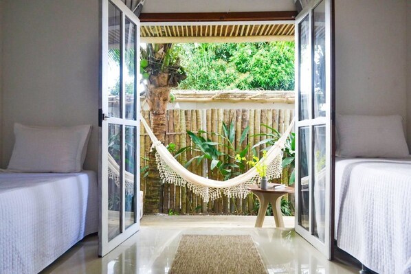 Suite Deluxe | Blackout drapes, iron/ironing board, free WiFi, bed sheets - Villa Jade Trancoso (Porto Seguro)