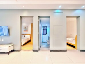 Boutique Apartment, 2 Bedrooms | Premium bedding, blackout drapes, soundproofing, iron/ironing board - Yujia Aparthotel - Zhongshan Lihe Square Branch (Zhongshan)