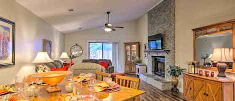 TV, fireplace, books