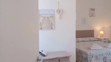 Comfort Triple Room, Non Smoking, Garden View | Individually furnished, desk, bed sheets