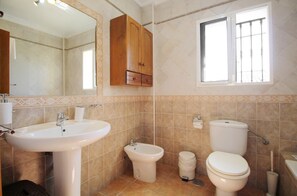 Bathtub, hair dryer, towels