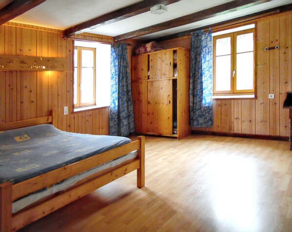 1 bedroom, desk, iron/ironing board, travel crib