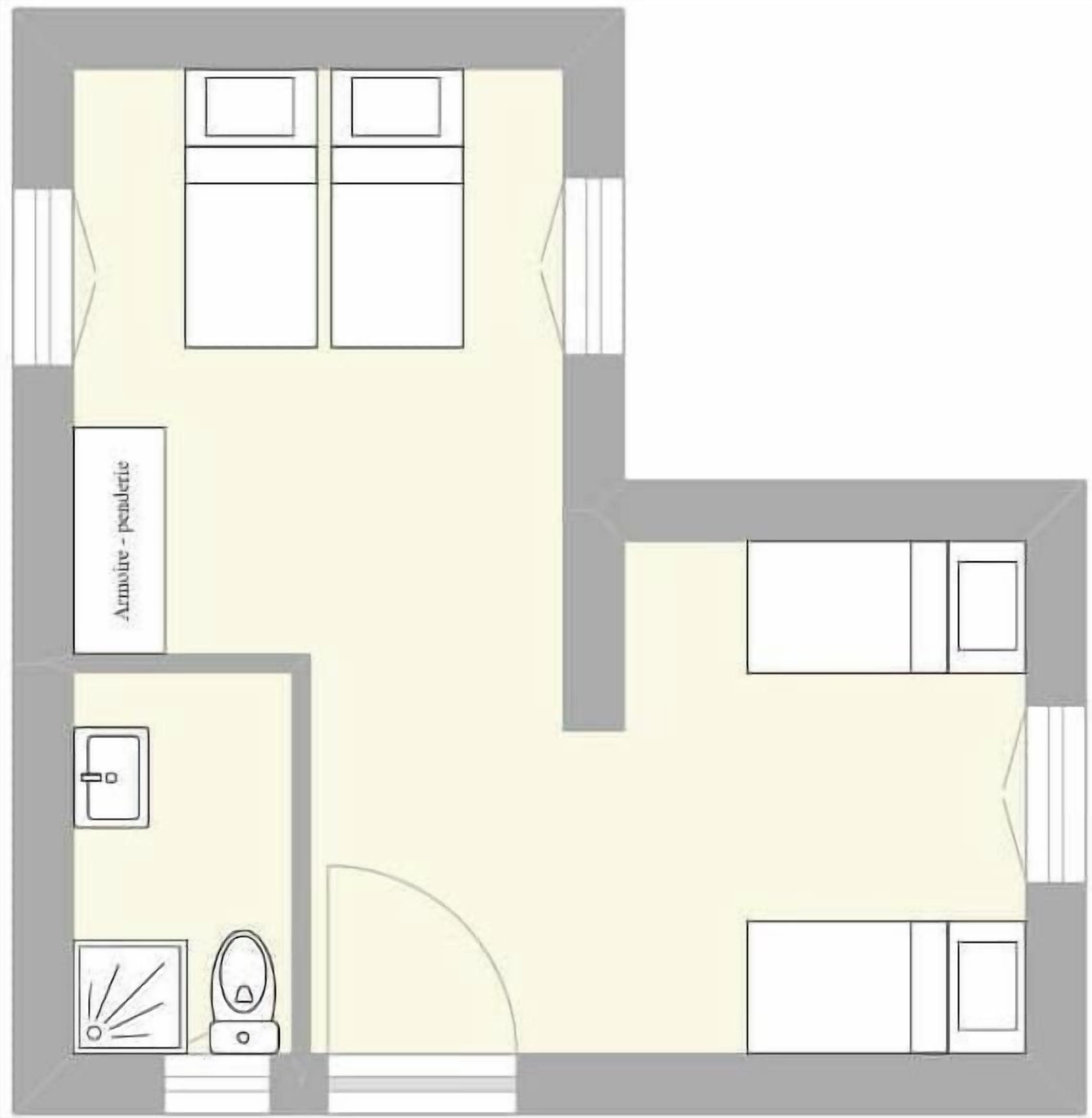 A hotel room layout with a bed, a desk, a chair, a wardrobe, and a bathroom.