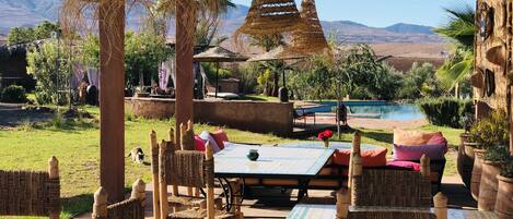 Breakfast, lunch, dinner served; Moroccan cuisine, pool views