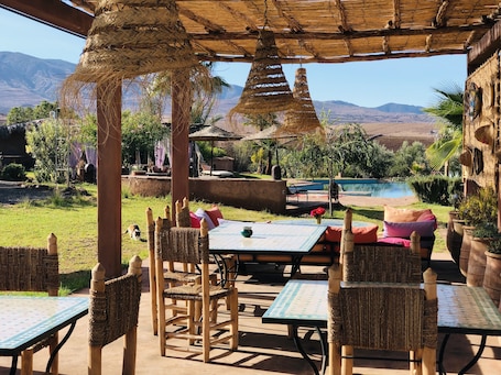 Breakfast, lunch, dinner served; Moroccan cuisine, pool views