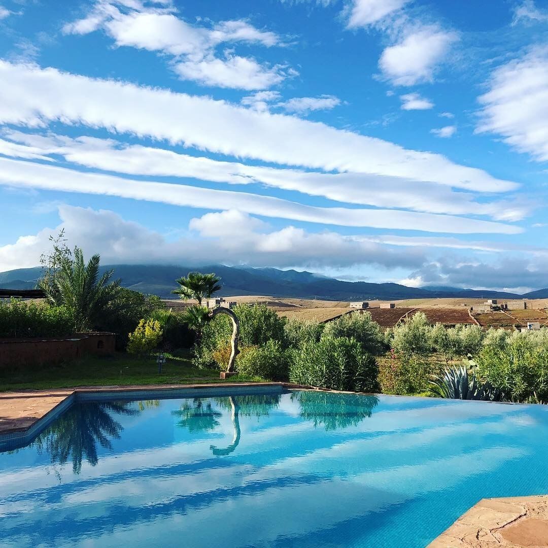 Outdoor pool, pool umbrellas, sun loungers