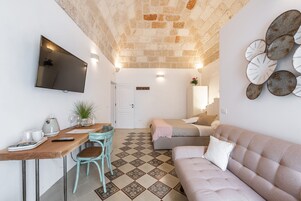 Deluxe Double Room, 1 Queen Bed | Premium bedding, minibar, individually decorated, desk