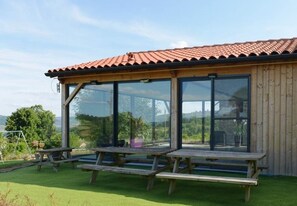Outdoor dining - Gîte de Bellevue with indoor pool (BERGESSERIN)