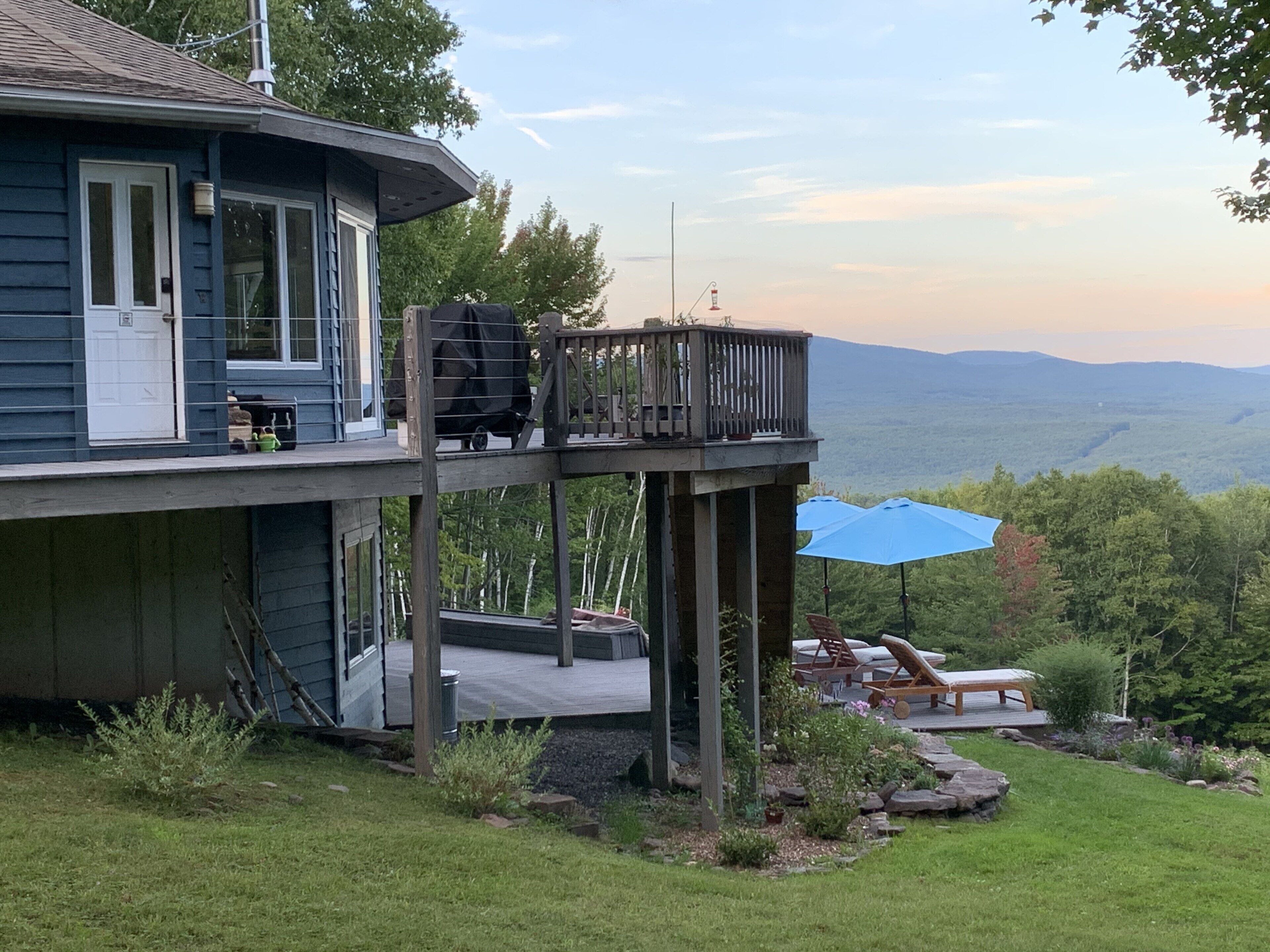 Sit on the top or bottom deck and enjoy views of the mountains and birch trees.