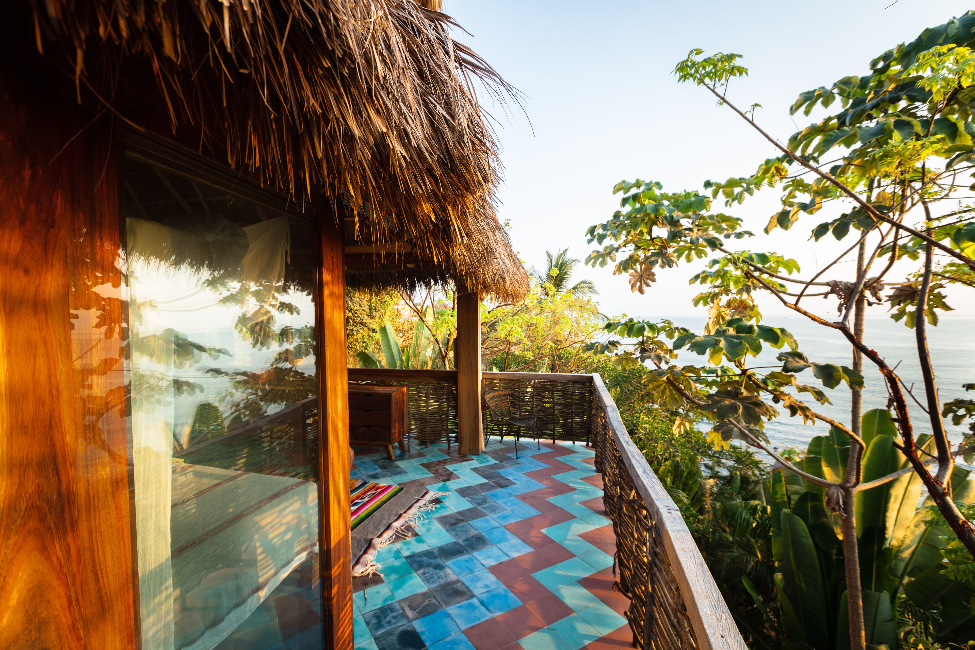 Beachfront home perched on hillside private botanical garden. Total privacy..