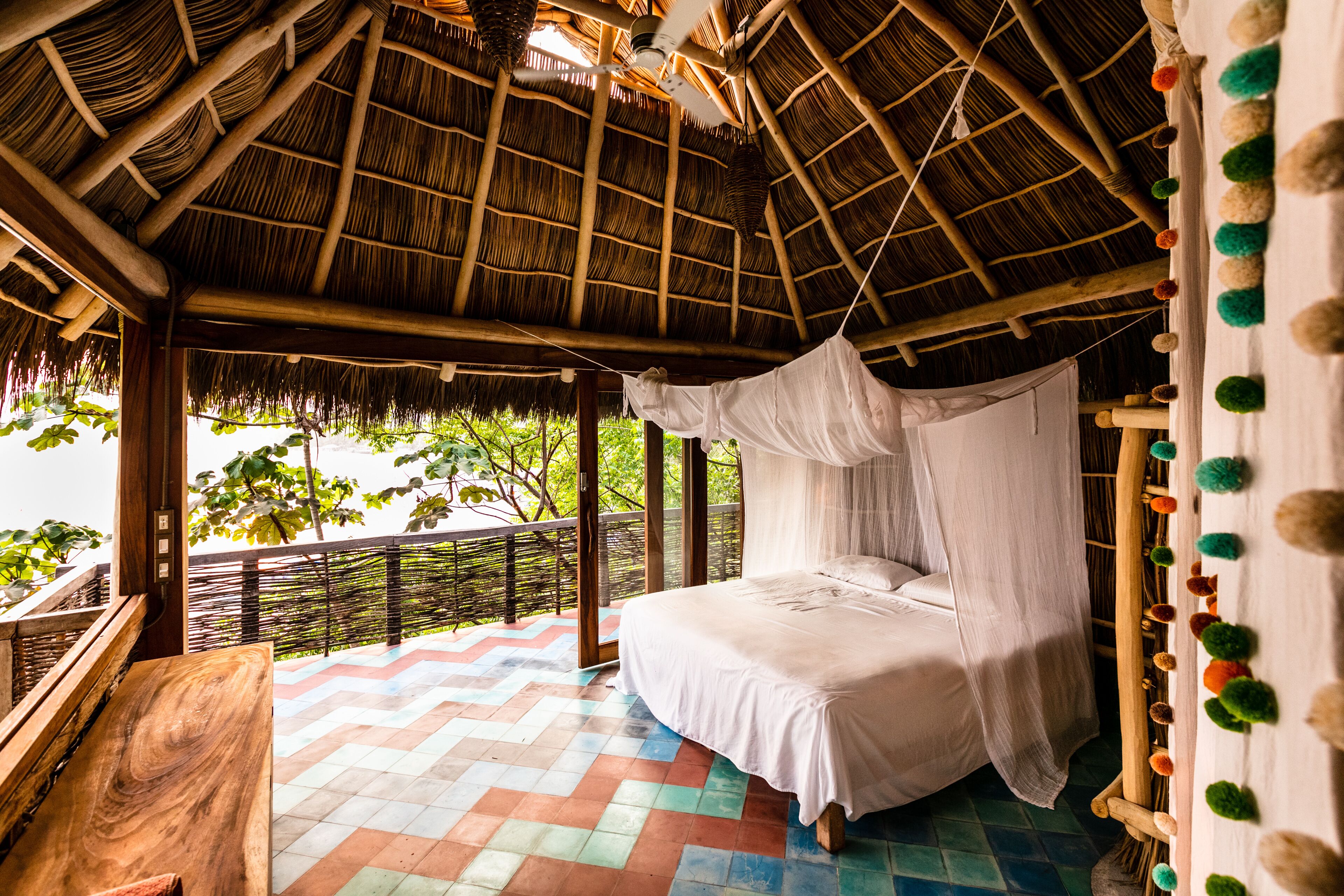 Beachfront home perched on hillside private botanical garden. Total privacy..