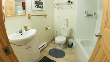 Combined shower/bathtub, hair dryer, towels, soap