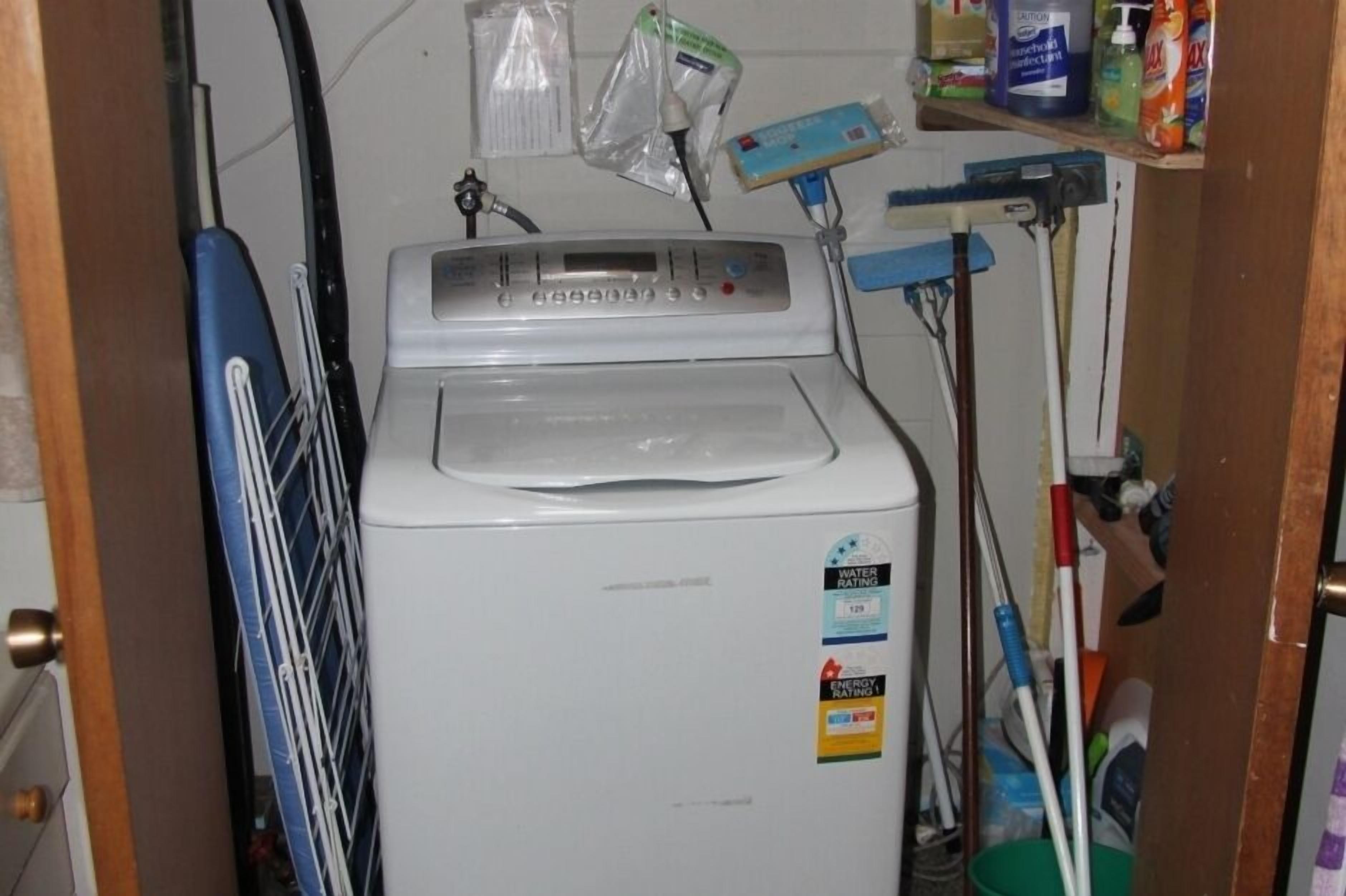 Washing machine in main bathroom off dining room 