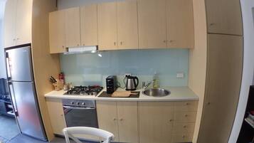 Espresso maker, coffee/tea maker, fridge, microwave