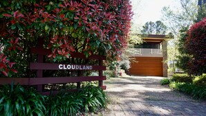 A gated entrance with a sign reading "CLOUDLAND".