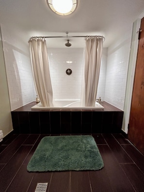 Combined shower/tub, hair dryer, towels, soap