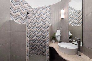 Bathtub, jetted bath, hair dryer, towels