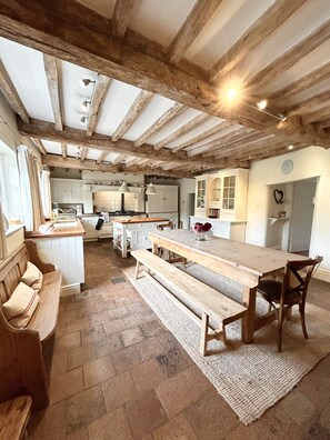 Farmhouse kitchen with oaks beams & Aga