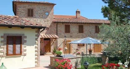 Farmhouse surrounded by the countryside of Umbria, panoramic view of Lake Trasimeno