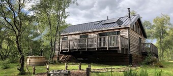 Flora is a Well equipped, Scandinavian style log cabin with wood fired hot tub