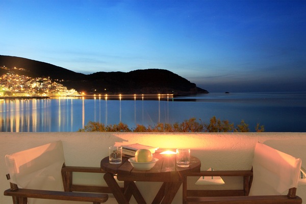 The big balcony offers spectacular views of the town and the endless sea blue.