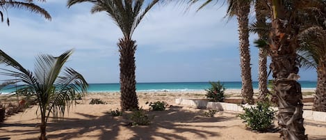 On the beach, sun loungers