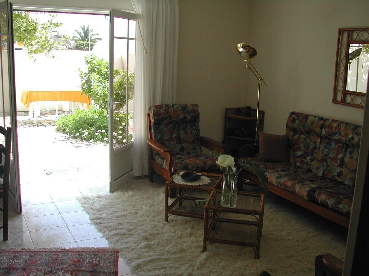 The house is located at the edge of town, close to the sea