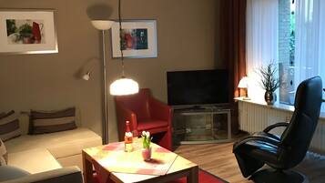 Smart-tv, bøger, stereoanlæg