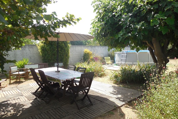 Jardin avec mobilier en teck