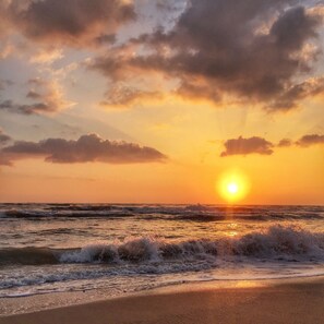 On the beach, sun-loungers, beach towels