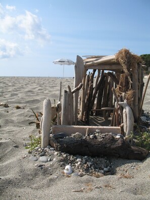 On the beach, sun-loungers, beach towels