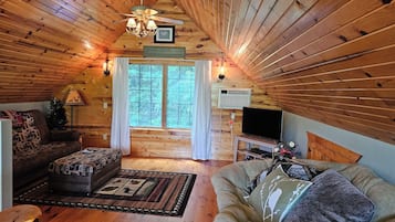 Smart TV, chimenea, reproductor de DVD y futbolito