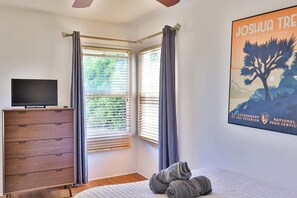 1 bedroom, desk, iron/ironing board, travel cot