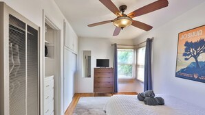 1 bedroom, desk, iron/ironing board, travel crib