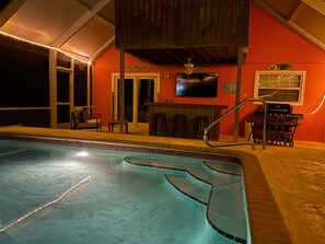 A heated pool - Naples Beach Escape | Pool, Canal Views & Tiki Vibes Near Pier & 5th Avenue (Naples)