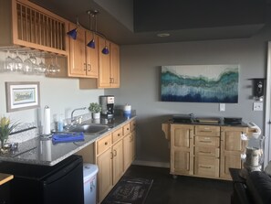 Fridge, microwave, stovetop, coffee/tea maker