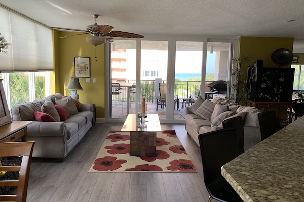 Family room view from the kitchen and eating area