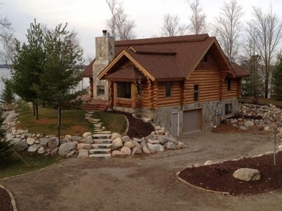 Gorgeous 3 Bdrm Log Cabin on Woman Lake with Beautiful Views
